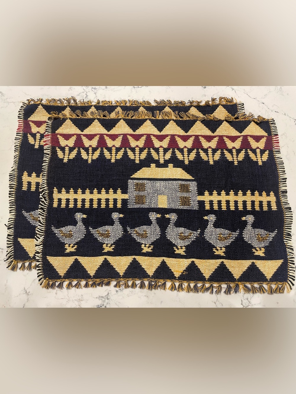 Double-sided woven, not printed placemats or small table runners.